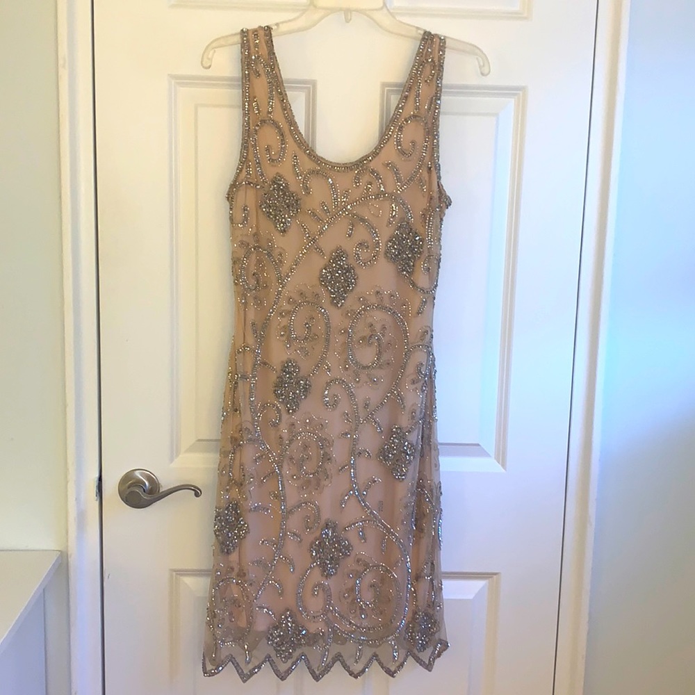 Beaded dress with mesh overlay. Size 6
